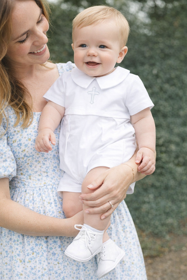 Baby Boy 4‑Piece Christening Outfit – Organic Cotton White Romper, Hat & Bib with Embroidered Cross  This elegant outfit includes a free pair of socks that perfectly complement and comlete the look